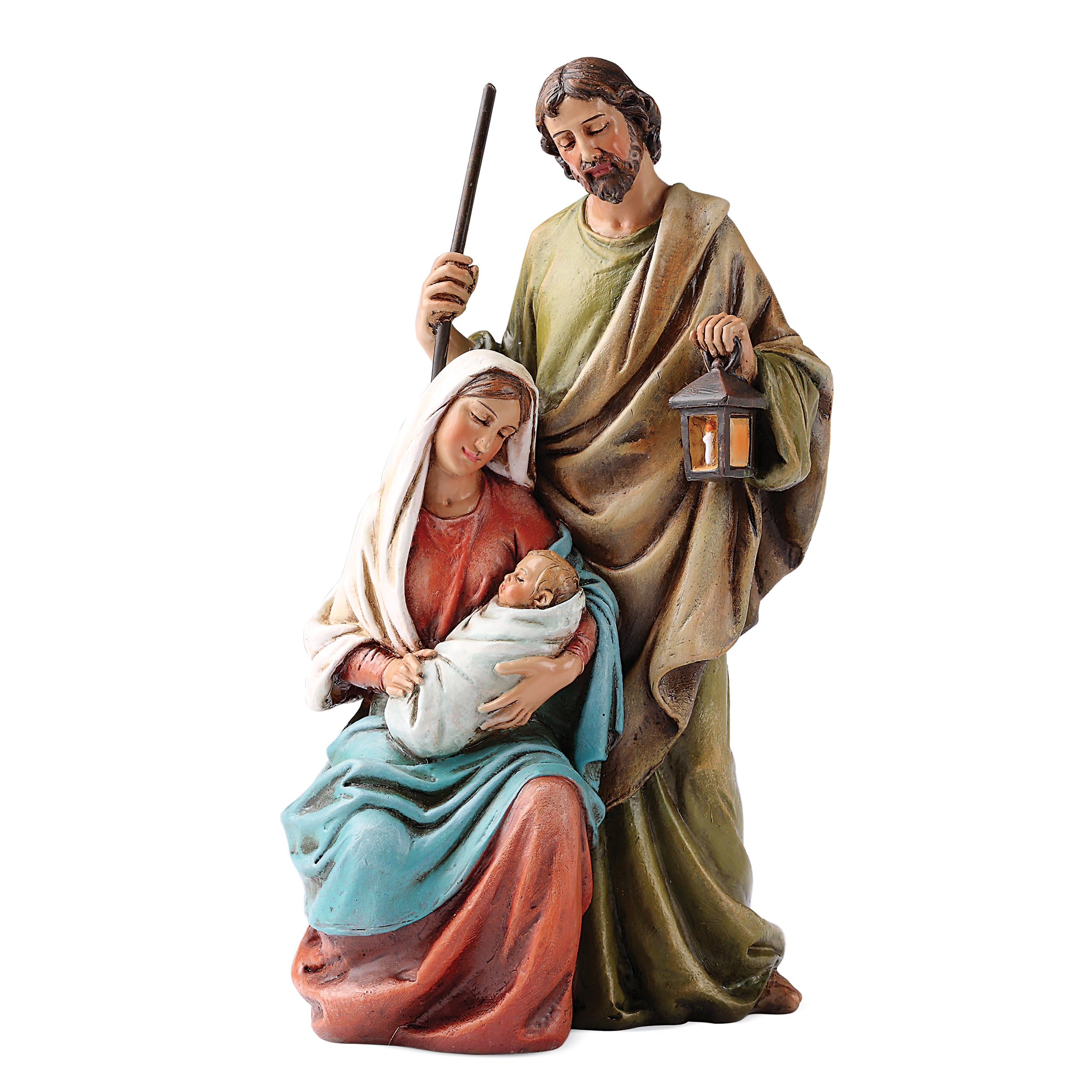 Statue of a religious scene with a woman holding a baby, a man with a staff, and a lantern on a white background