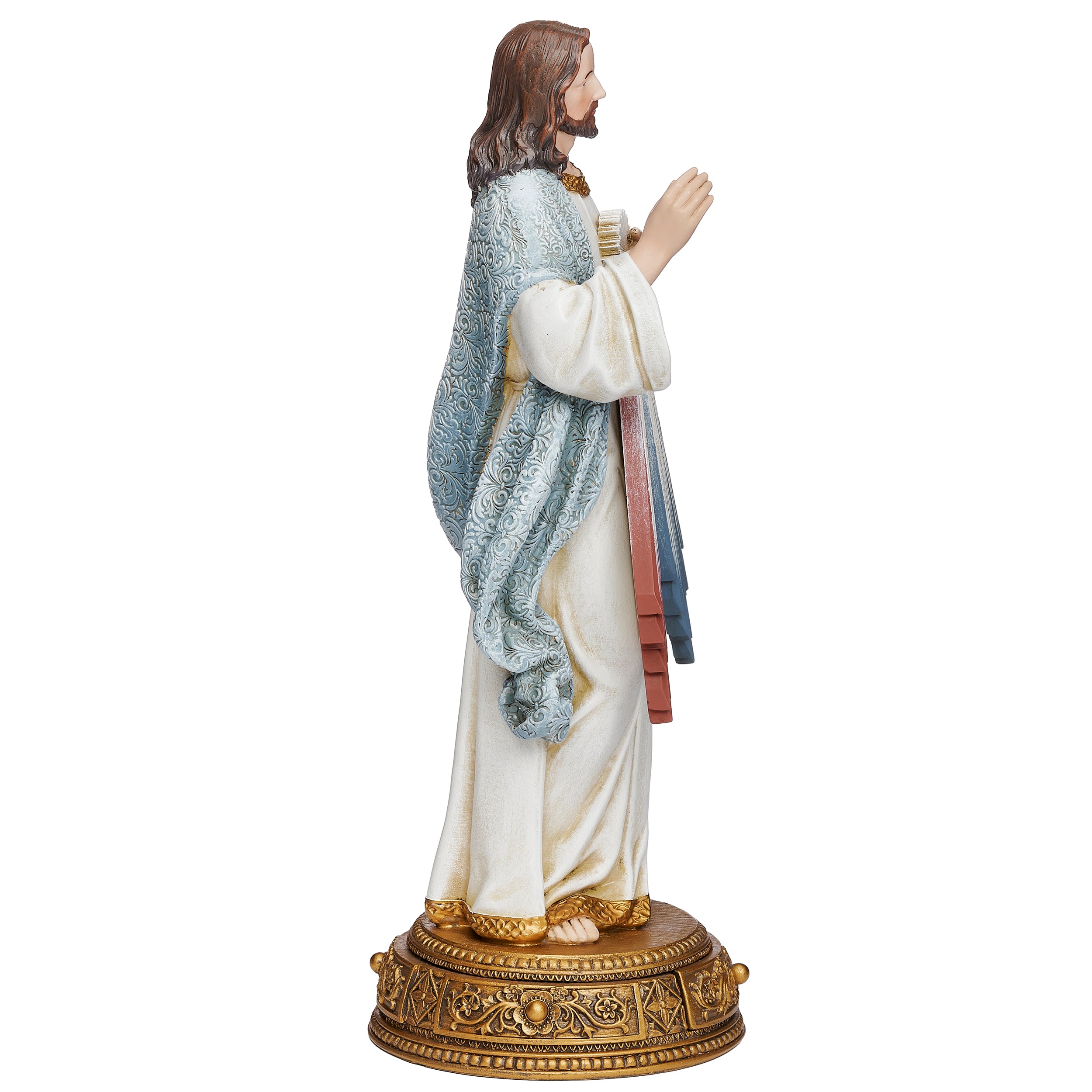 Statue of a religious figure in a robe with a white background