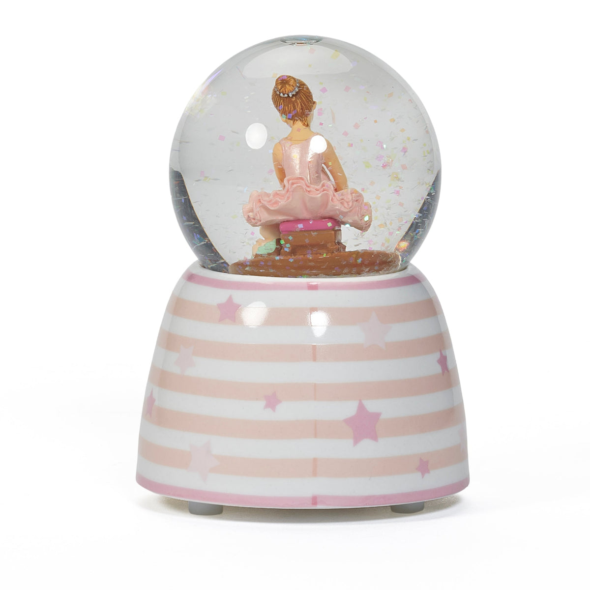 Rear angled view of Glitterdome Musical Ballerina showing the ballerina from behind inside the clear globe and the pink striped music box base