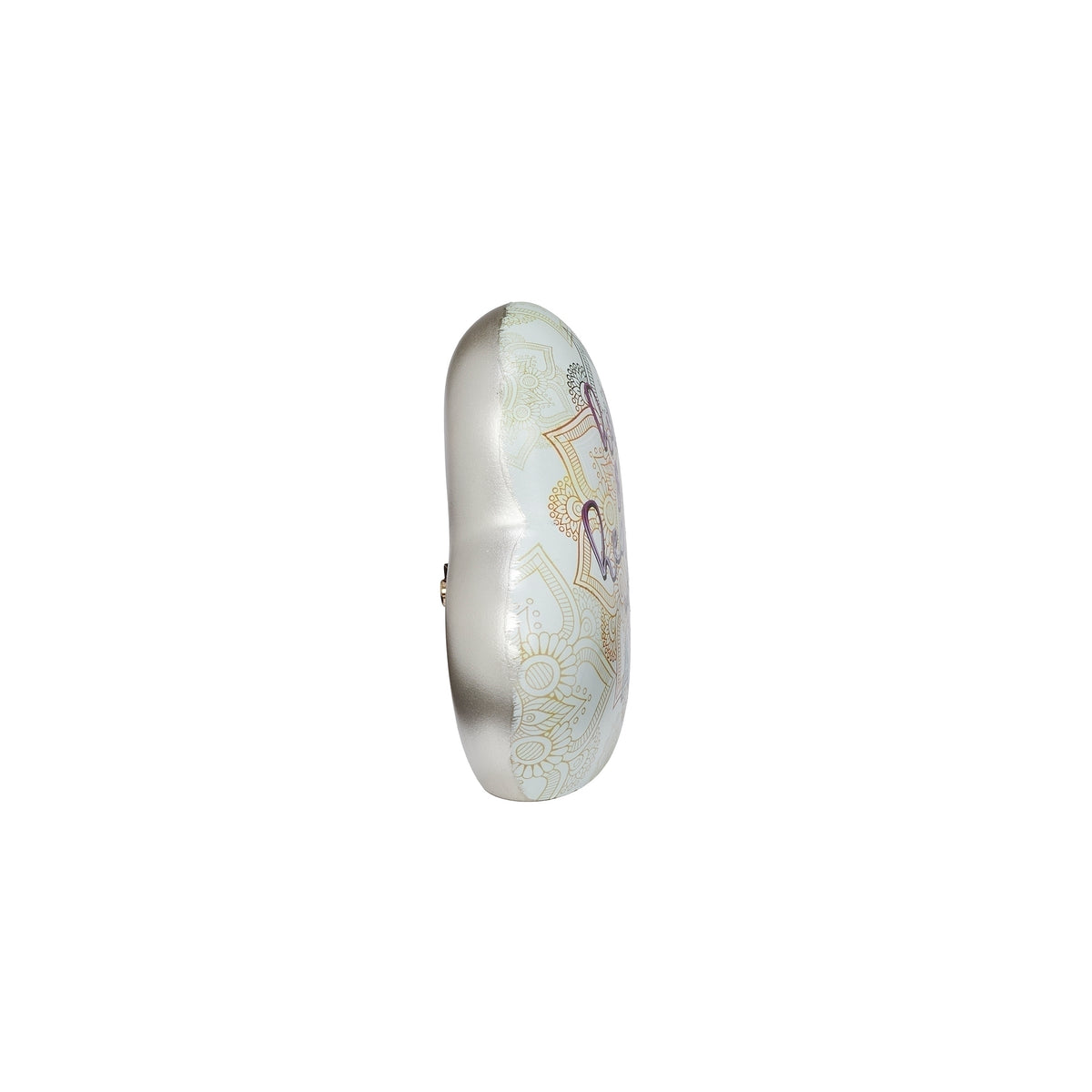 Side view of musical heart showing its patterned rounded edge and freestanding profile.