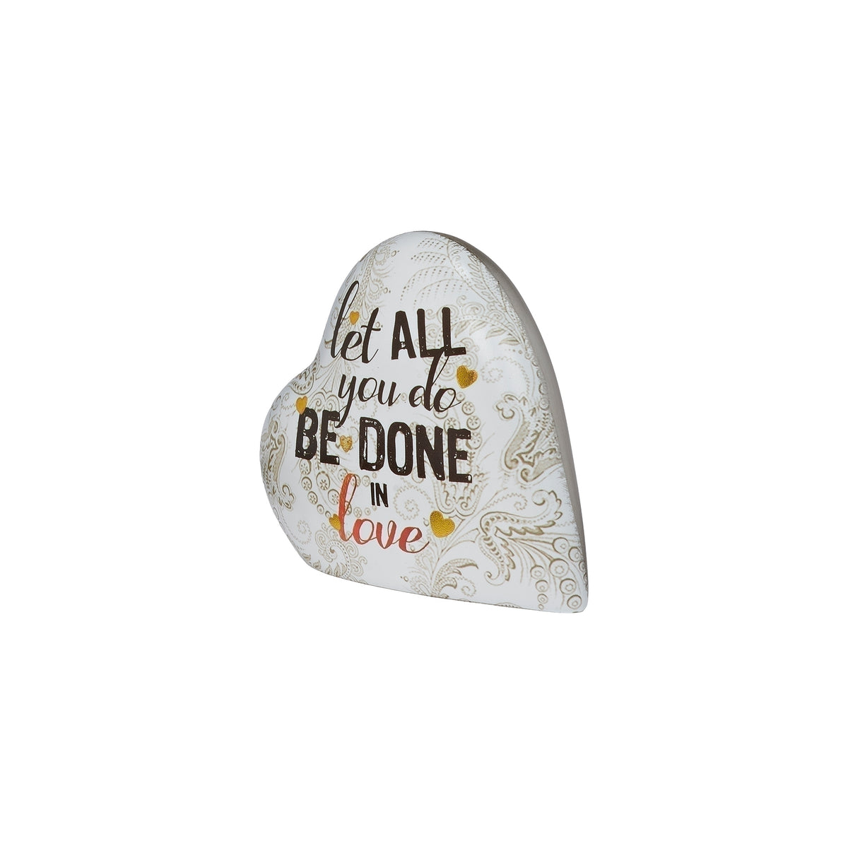 Angled front view of musical heart showing its decorative lettering and curved shape.