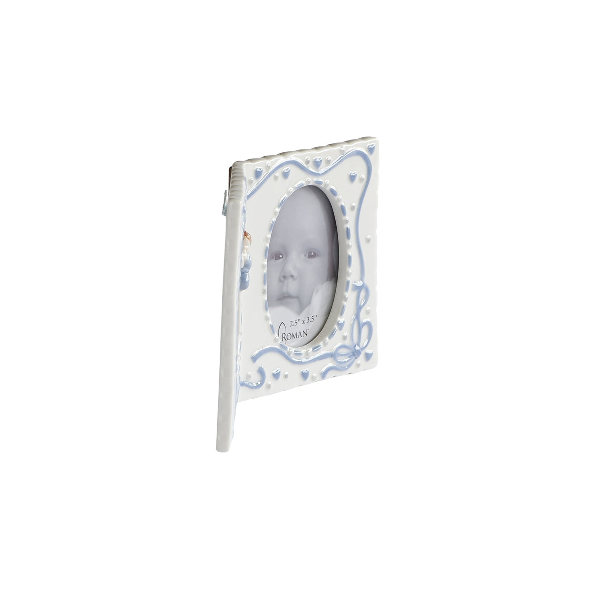 Side view of blue Hanging Cross & Praying Child Keepsake Picture Frame showing the folding frame and baby photo opening