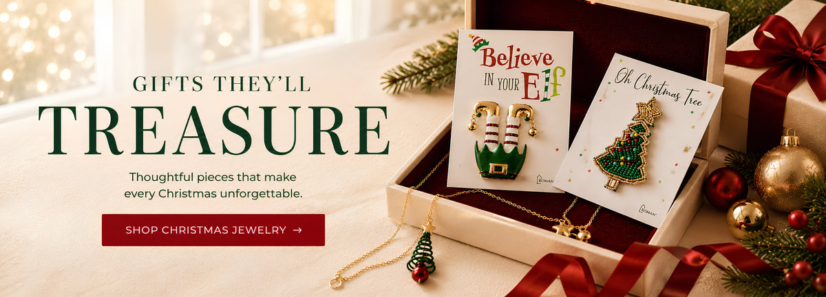 A holiday gift box containing Christmas jewelry, including a gold and green elf cuff bracelet, a green Christmas tree pendant, and a card that reads 'Oh Christmas Tree.' The scene is styled with red ribbons, ornaments, pine branches, and warm festive lighting, with large text on the left reading 'GIFTS THEY'LL TREASURE' and a 'SHOP CHRISTMAS JEWELRY' button.