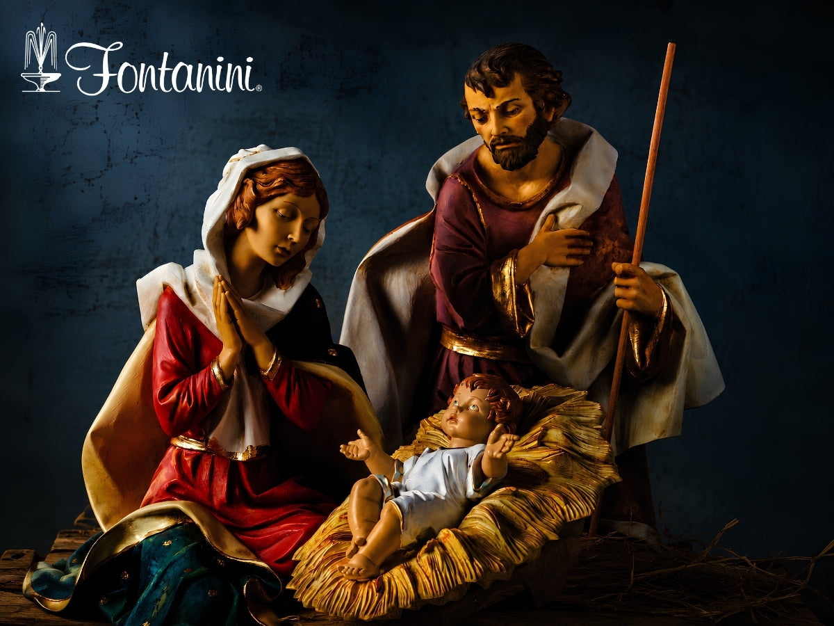 A Fontanini religious nativity scene sculpture featuring Mary, Joseph, and baby Jesus in a straw manger, set against a dark textured background.