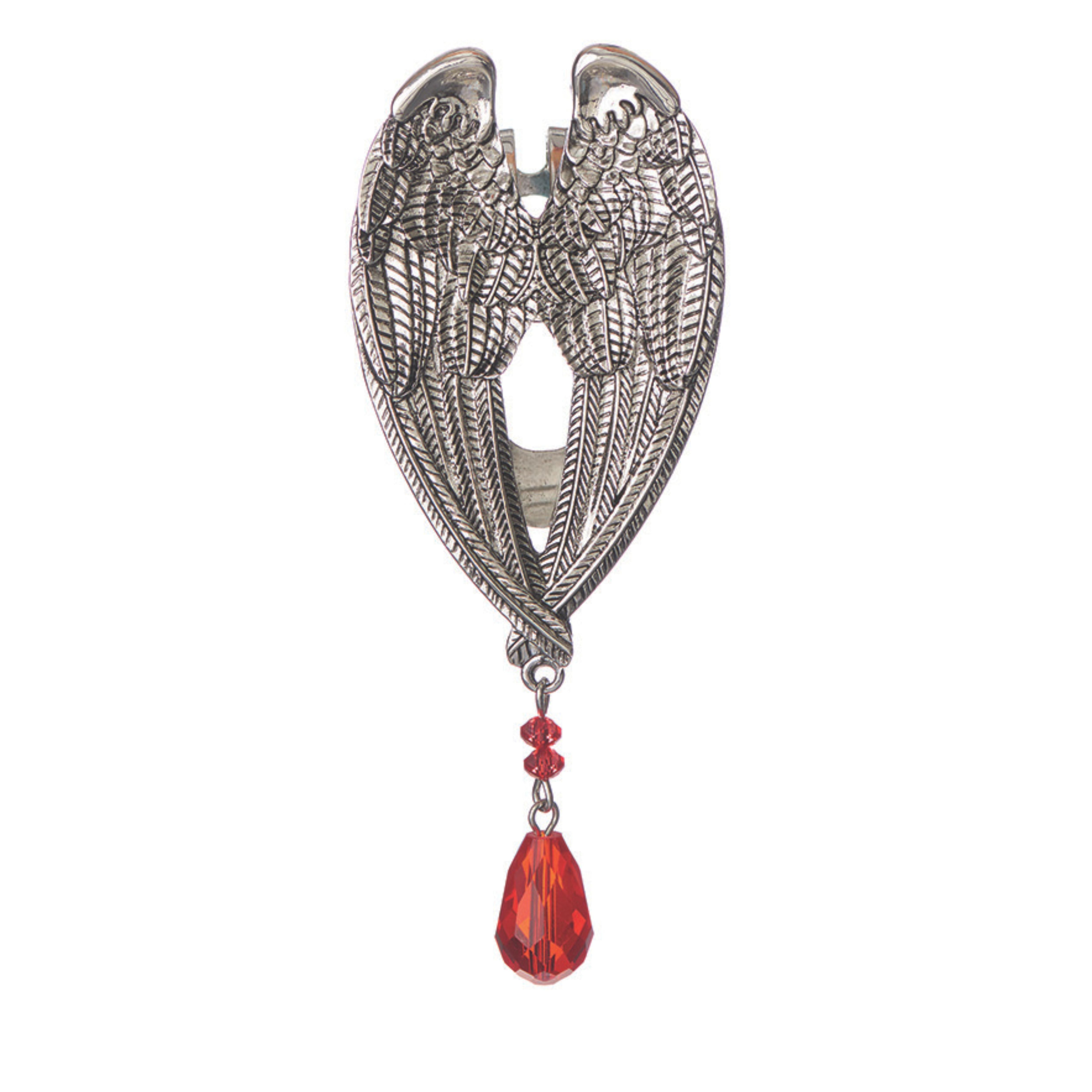 Decorative brooch with wing design and red gemstone on a white background