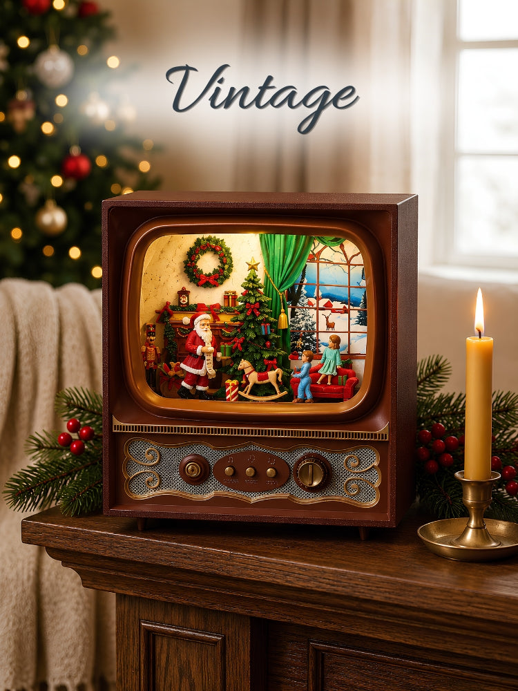A vintage-style wooden television set with a glowing Christmas diorama inside, placed on a wooden cabinet in a warm holiday room. A lit candle, evergreen branches with red berries, and the word 'Vintage' appear in the scene.